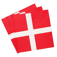 Røde servietter med hvidt korsdesign, kvadratiske og pænt arrangerede i en bunke.